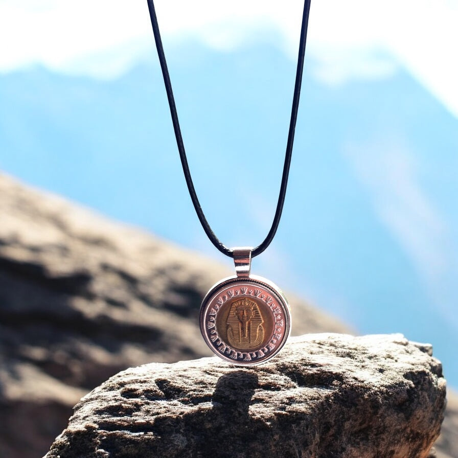 Tutankhamun pendant on black velvet jewelry box